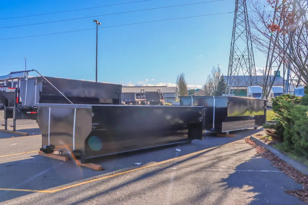 Roll-off dumpster ready for waste disposal at job site for Roofing Dumpster Rental in Ridgefield